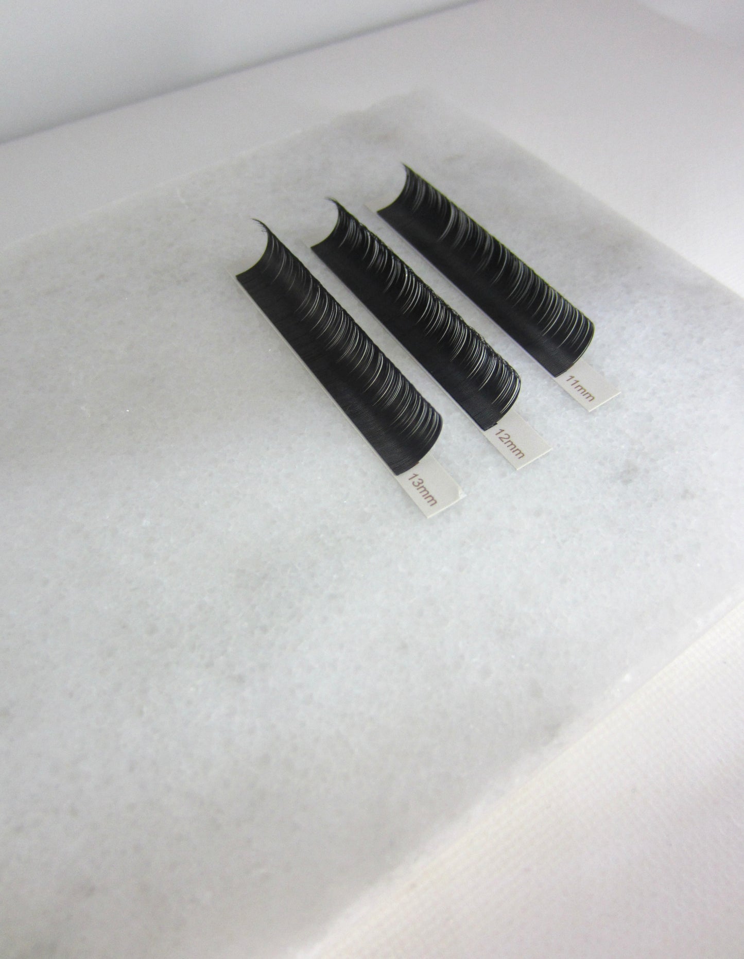 gloss lash tiles